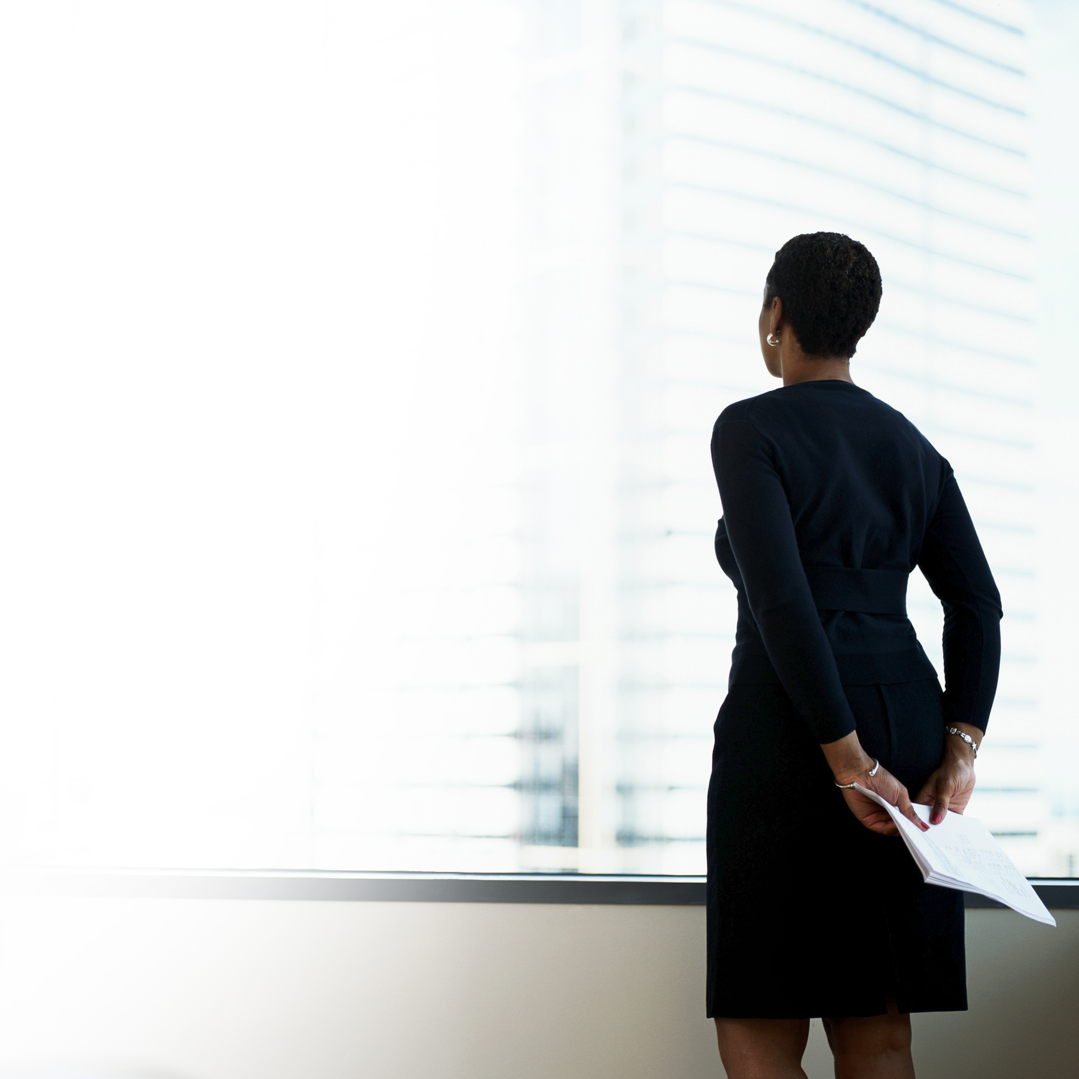 Women thinking about how DFIN helps more than one third of publicly held North American companies produce and distribute their proxy materials