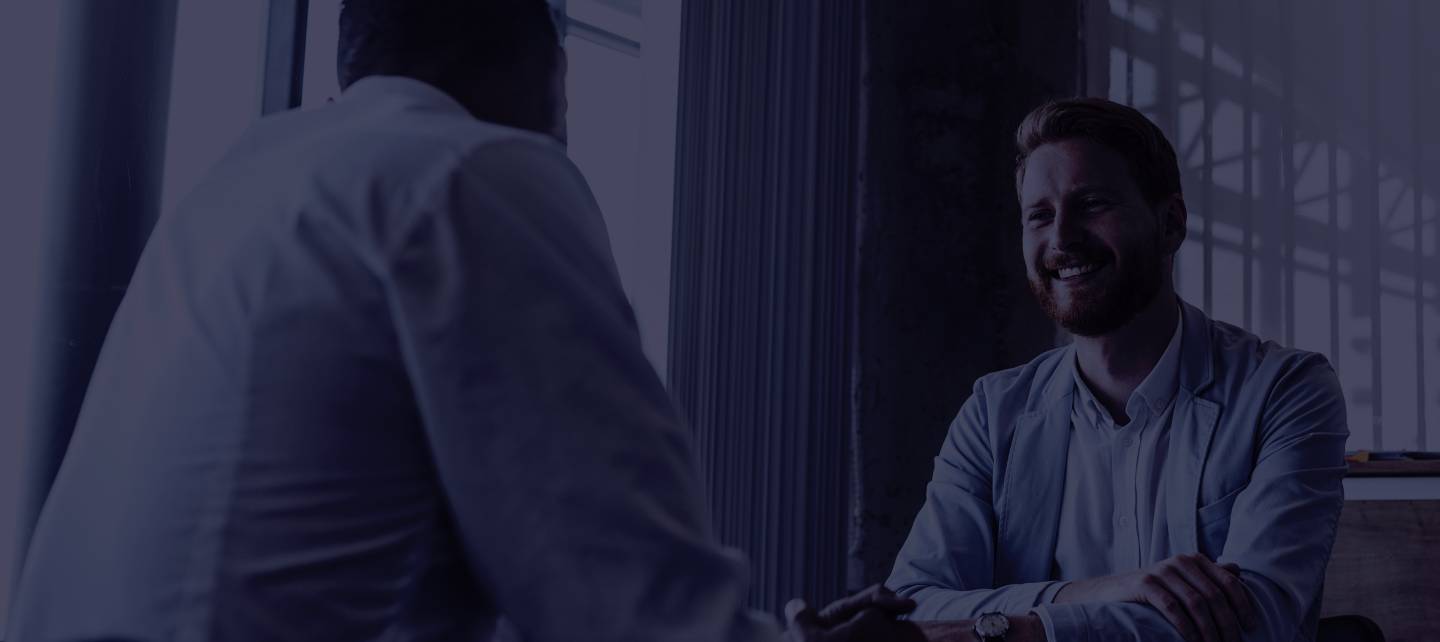 Two businessmen in a meeting