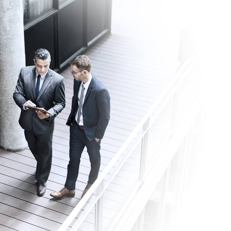 Gentleman discussing ArcRegulatory, DFIN’s innovative global regulatory platform for transparency over your regulatory requirements in Europe.